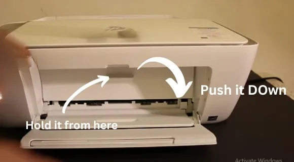 open the front tray to insert the ink cartridges